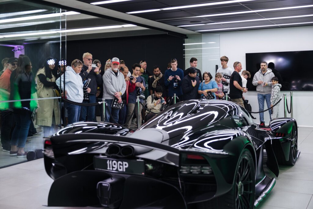 Folk oogling a supercar, this one an Aston Martin Valkyrie.