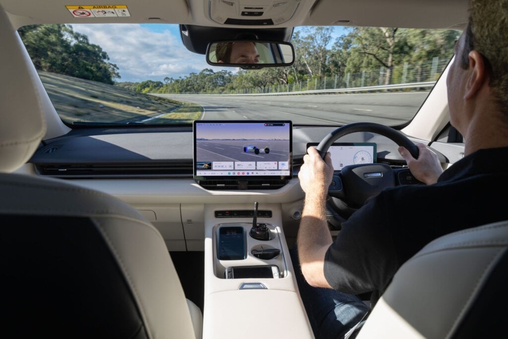 Here Rob drives a GWM SUV on the high-speed oval track.