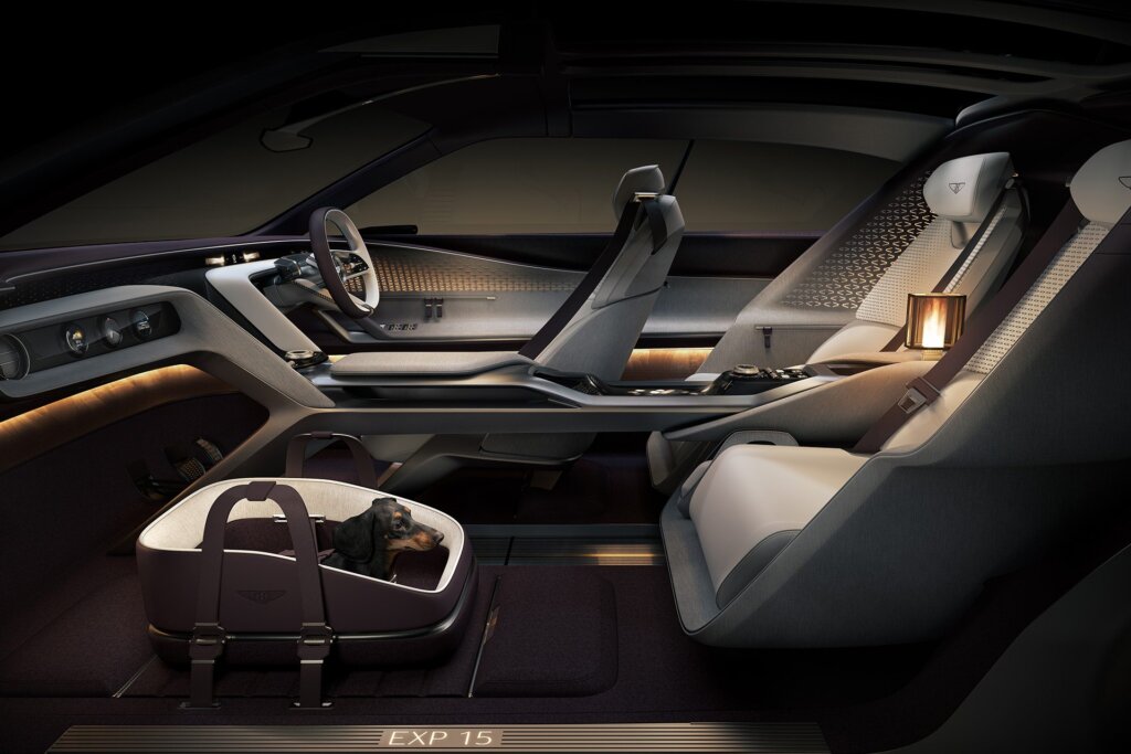 Cute. The dog rides in pride of place while poor old Mumsy takes a back seat.