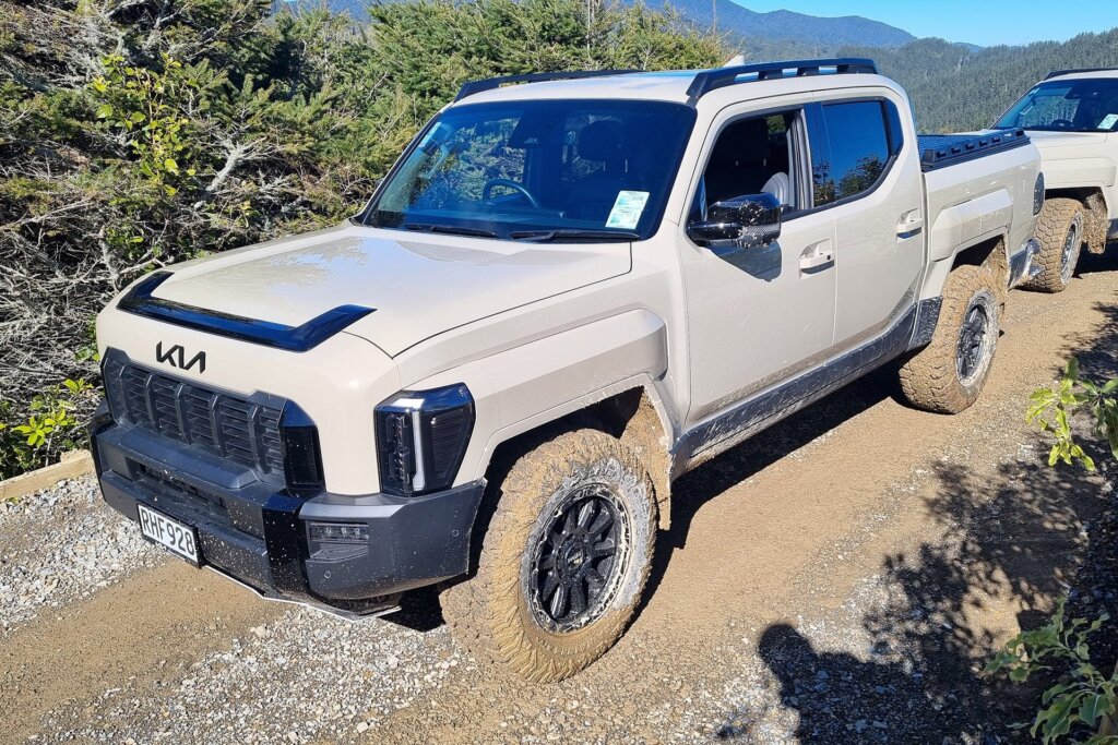 Kia Tasman in the forest