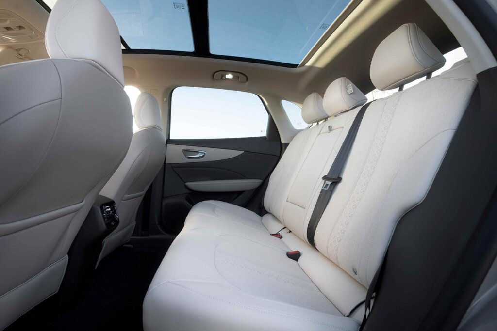 Rear seats and sunroof on display.