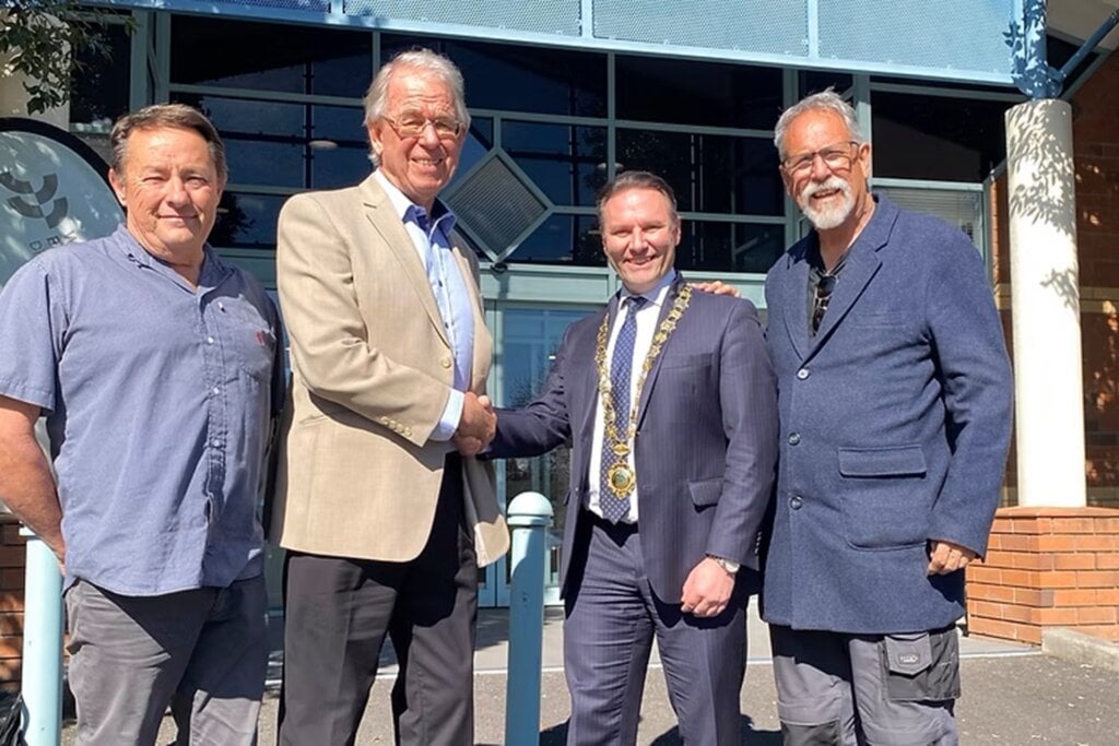 The three directors of the project with WBOP Mayor James Denyer.