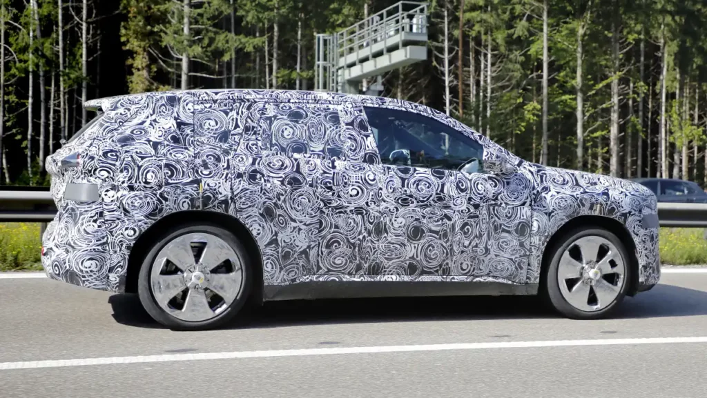 Big 20-inch wheels seem small with all the camou over the glasshouse.