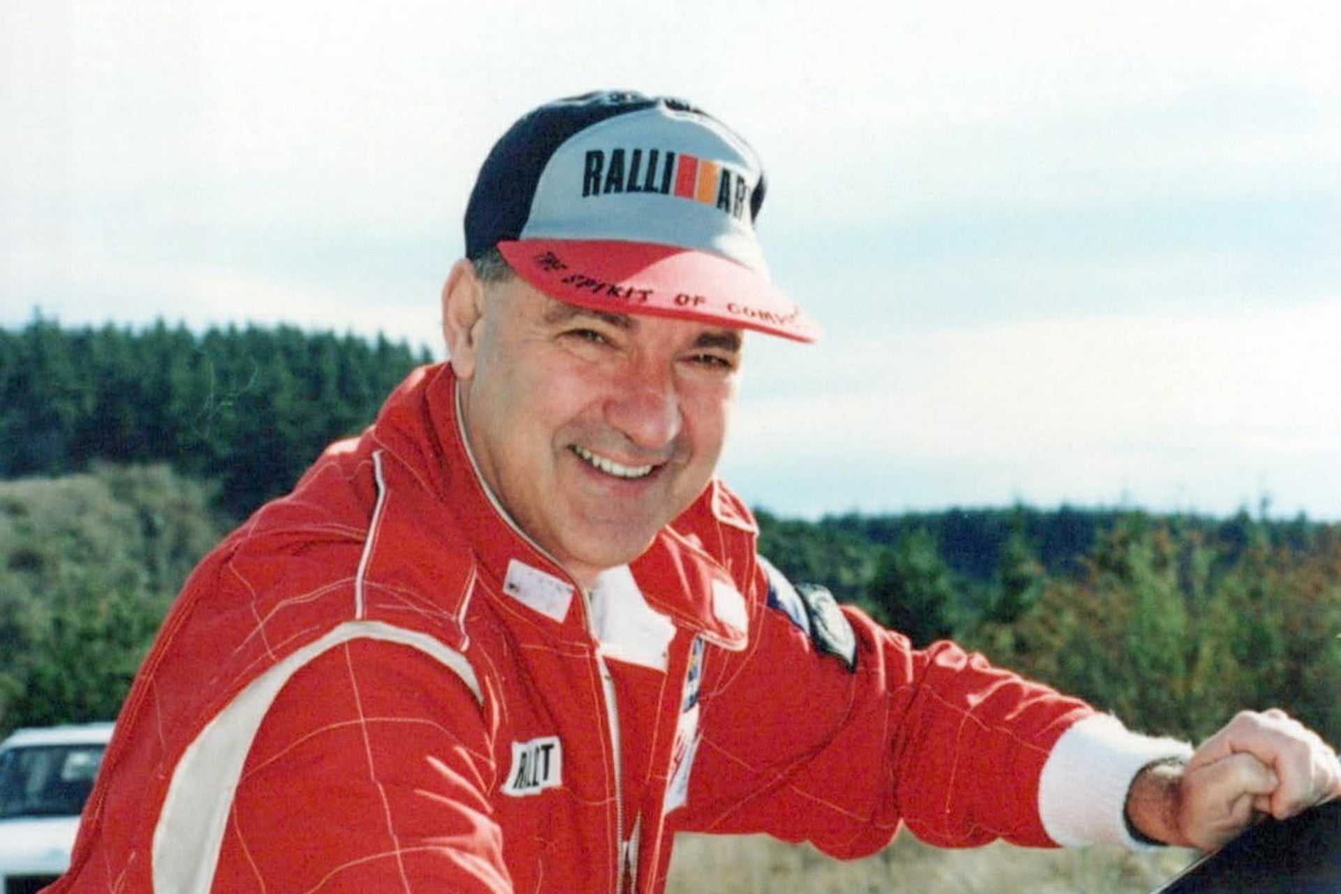 Morrie Chandler with red overalls
