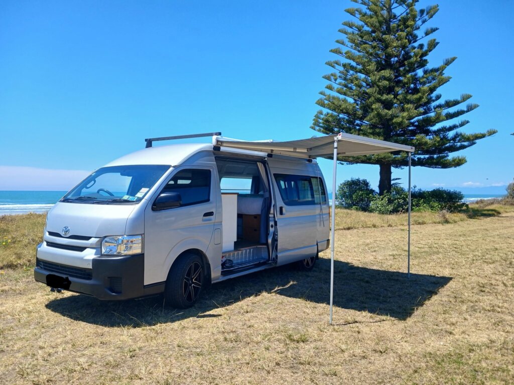 Toyota Hiace camper on grass