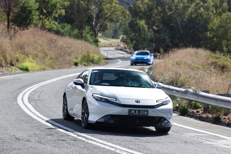 white Prelude on the road