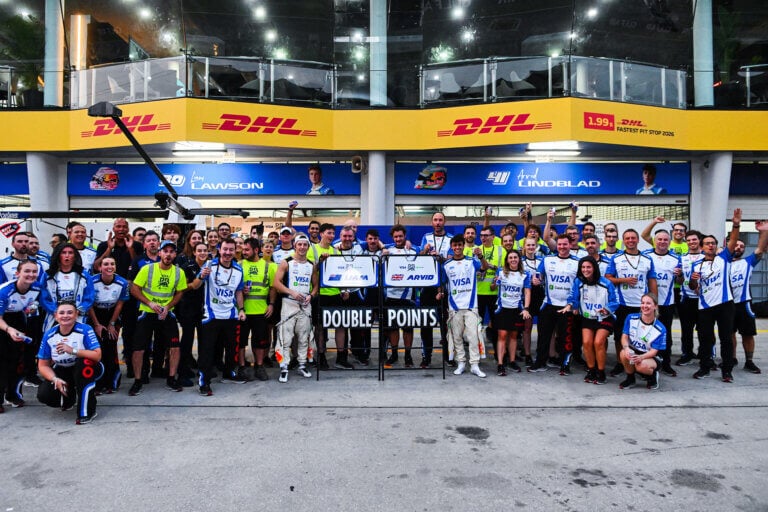 lawson and team in front of pits