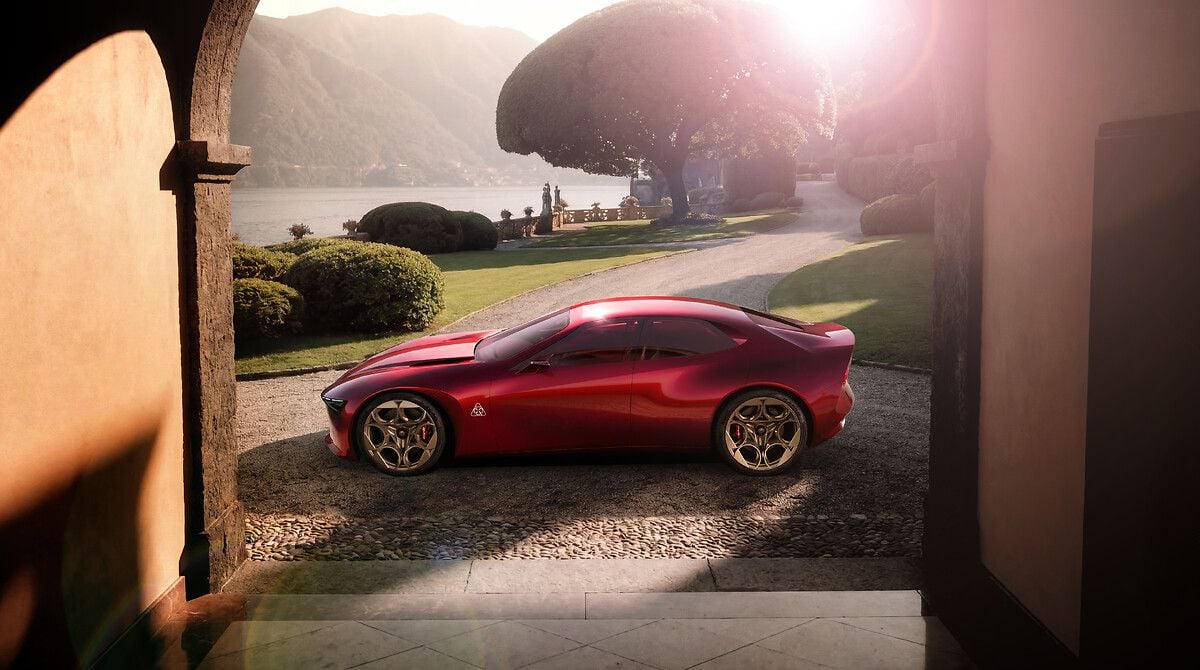 Red Alfa Romeo Cuorerosso 2+2 coupe concept parked at an Italian villa