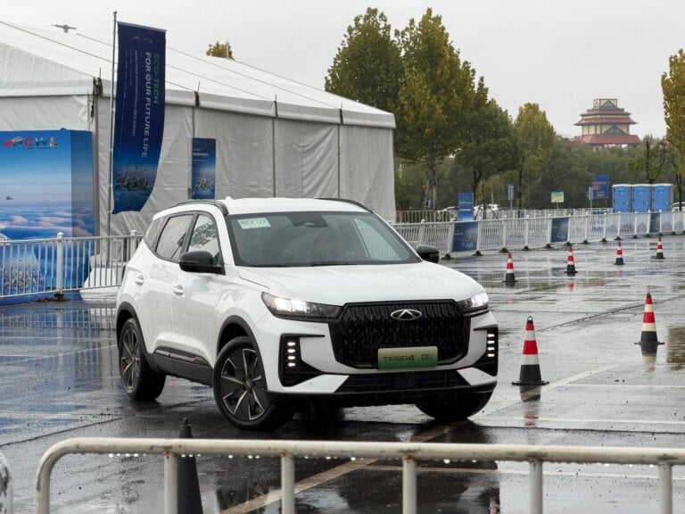 White 2027 Chery Tiggo 4 Hybrid facelift with new front grille on a wet test course in Wuhu, China