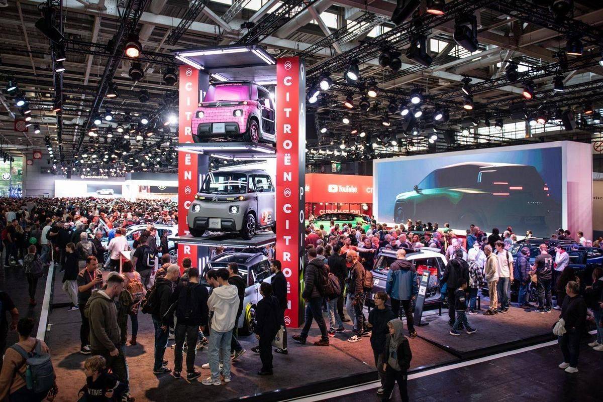 Visitors packing a hall at the 2024 Paris Motor Show