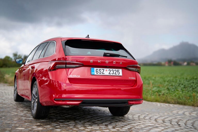 Red Skoda on cobblestones
